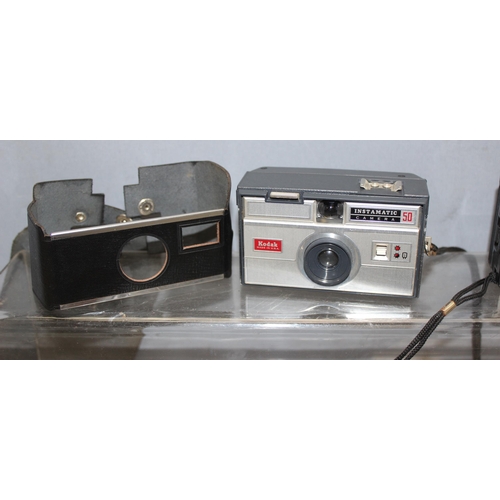 650 - Qty of scientific related items to incl 2 vintage calculators, cameras and binoculars