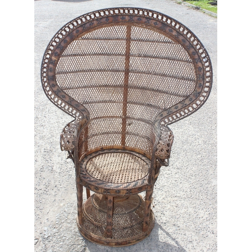 66 - A large vintage wicker peacock chair, approx 110cm wide x 53cm deep x 146cm tall