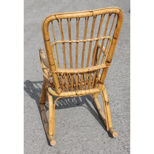 73 - In the manner of Franco Albini, a retro bamboo rocking chair, approx 57cm wide x 83cm deep x 115cm t... 