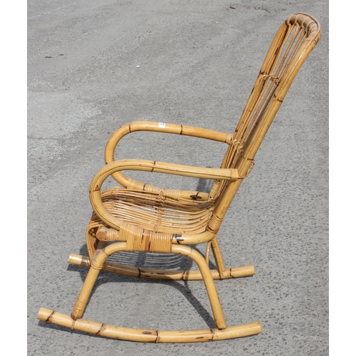 73 - In the manner of Franco Albini, a retro bamboo rocking chair, approx 57cm wide x 83cm deep x 115cm t... 