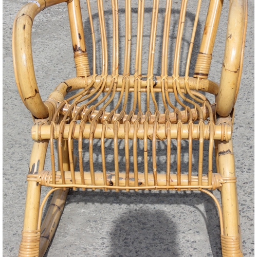 73 - In the manner of Franco Albini, a retro bamboo rocking chair, approx 57cm wide x 83cm deep x 115cm t... 