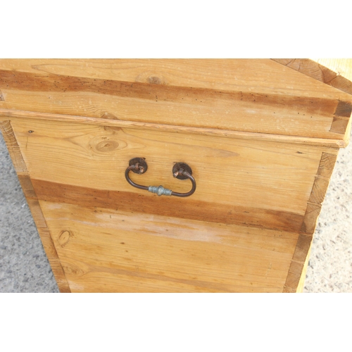 74 - An antique dome topped pine storage box or trunk, approx 102cm wide x 64cm deep x 64cm tall