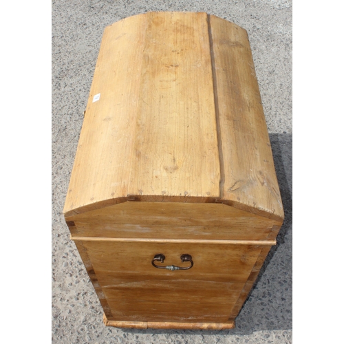 74 - An antique dome topped pine storage box or trunk, approx 102cm wide x 64cm deep x 64cm tall