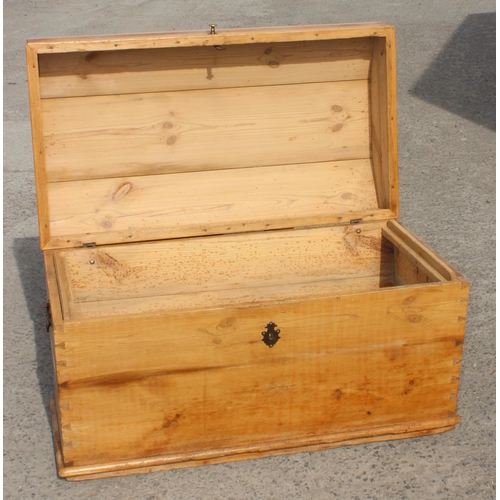 74 - An antique dome topped pine storage box or trunk, approx 102cm wide x 64cm deep x 64cm tall