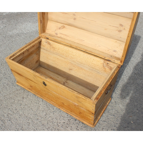 74 - An antique dome topped pine storage box or trunk, approx 102cm wide x 64cm deep x 64cm tall