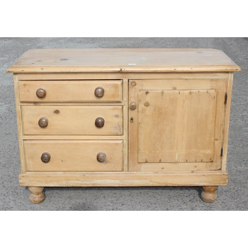 76 - A Victorian pine sideboard comprising of 3 drawers and a cupboard, with bun handles and bun feet, ap... 