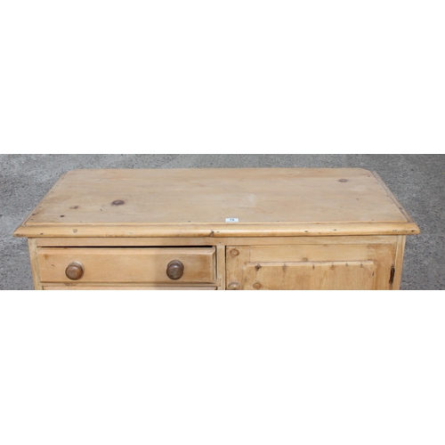 76 - A Victorian pine sideboard comprising of 3 drawers and a cupboard, with bun handles and bun feet, ap... 