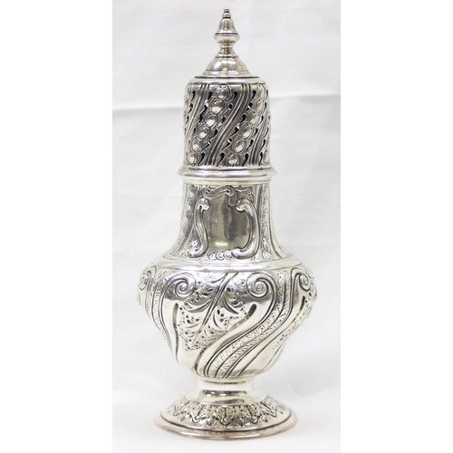 1029 - A large Victorian silver embossed sugar caster, highly decorative, marked for London 1888 by Sibray,... 