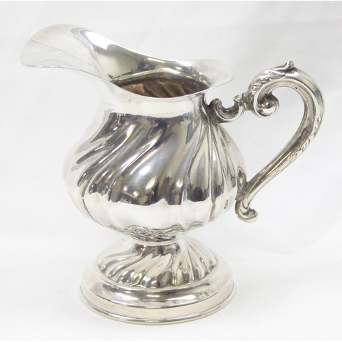 1034 - A vintage Italian silver cream or milk jug, marked 800 and XRF confirmed, by ADP, approx 8cm tall in... 