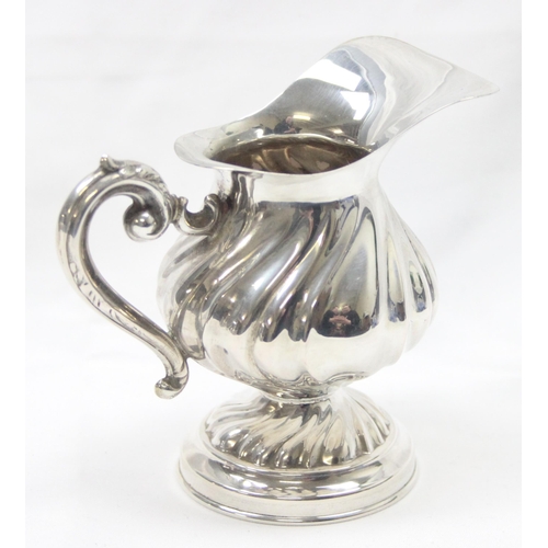 1034 - A vintage Italian silver cream or milk jug, marked 800 and XRF confirmed, by ADP, approx 8cm tall in... 