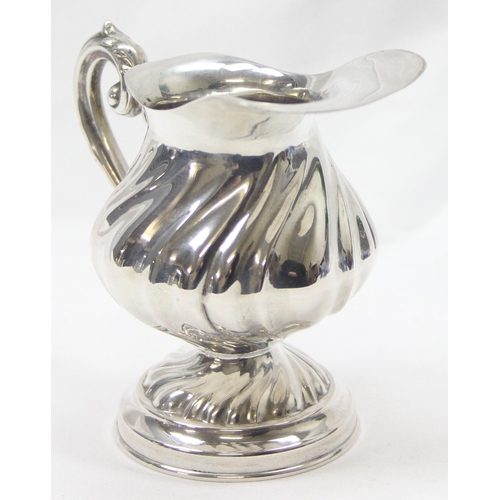 1034 - A vintage Italian silver cream or milk jug, marked 800 and XRF confirmed, by ADP, approx 8cm tall in... 