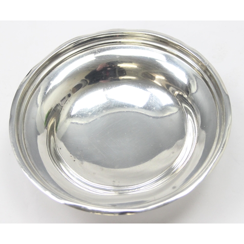 1040 - An antique silver shallow bowl with footed base, marked for London 1923 by Harman & Co, approx 11.5c... 