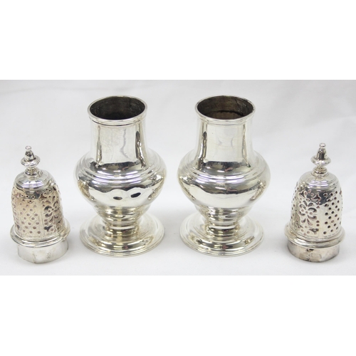 1042 - A pair of George II period silver pepper pots, London 1748 by Samuel Wood, each approx 13cm tall, ap... 