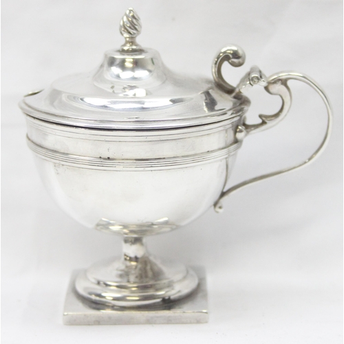 1044 - A large silver mustard pot of Georgian form, London 1920, makers mark rubbed, approx 10cm tall, appr... 