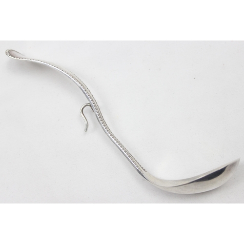 1059 - An unusual vintage Dutch silver pickle or preserve spoon with hanging hook, fully marked and XRF con... 