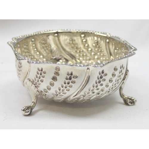 1060 - A Victorian silver sugar bowl with 3 pad feet and unusual embossed decoration, London 1881 by Henry ... 