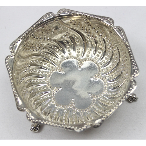 1060 - A Victorian silver sugar bowl with 3 pad feet and unusual embossed decoration, London 1881 by Henry ... 