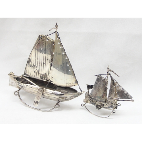 1065 - 2 small silver models of Oriental boats, both indistinctly marked but both XRF confirmed to be 85% p... 