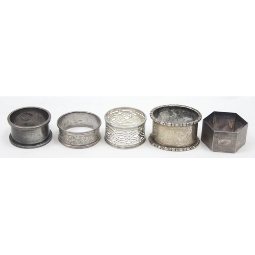 1068 - 5 assorted silver napkin rings, various dates, makers and designs, approx 111.92g gross