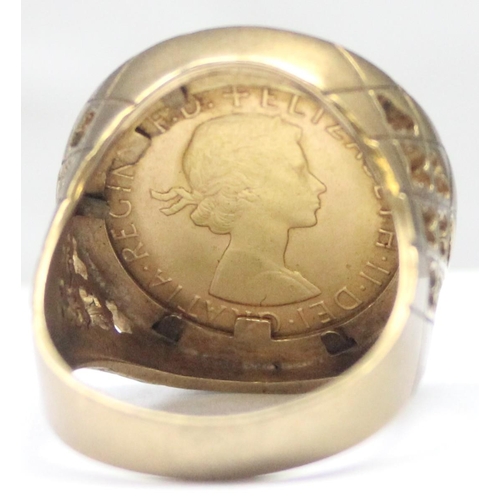 1100 - A large 9ct gold mounted full sovereign ring, the pierced 9ct gold shank set with a 22ct gold 1967 f... 