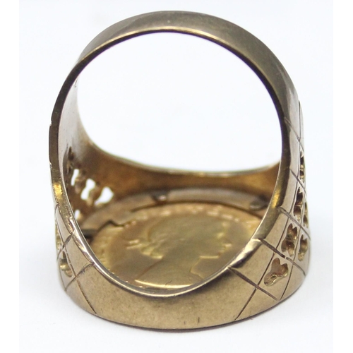 1100 - A large 9ct gold mounted full sovereign ring, the pierced 9ct gold shank set with a 22ct gold 1967 f... 