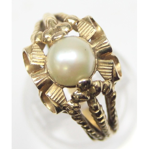 1102 - A large retro 18ct gold and pearl cocktail ring with decorative pierced setting, indistinctly marked... 