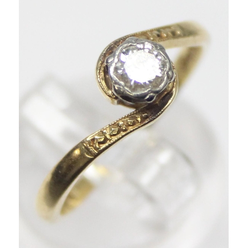 1103 - A vintage 18ct gold and solitaire diamond ring in engraved crossover platinum setting, marked and XR... 