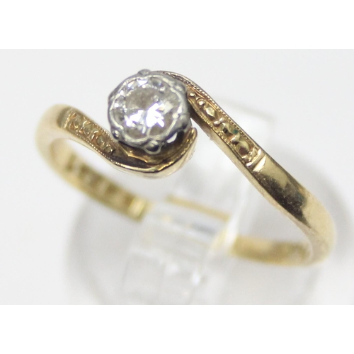 1103 - A vintage 18ct gold and solitaire diamond ring in engraved crossover platinum setting, marked and XR... 