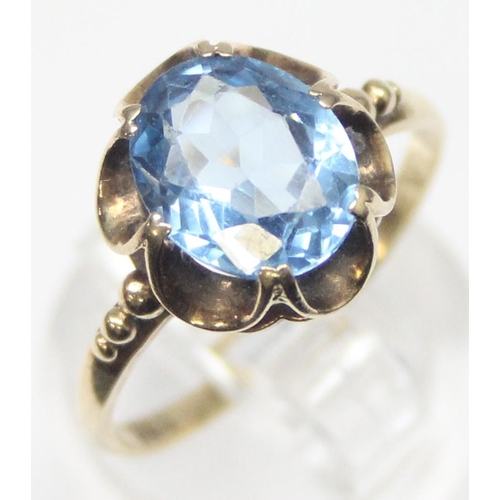 1114 - A vintage 9ct gold and blue stone cocktail ring, marks rubbed but XRF tested as 9ct gold, approx siz... 