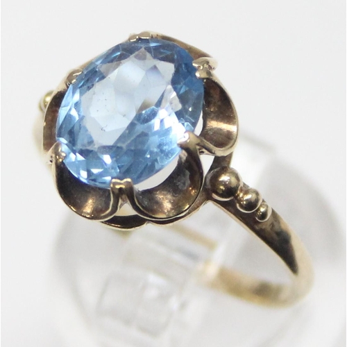 1114 - A vintage 9ct gold and blue stone cocktail ring, marks rubbed but XRF tested as 9ct gold, approx siz... 