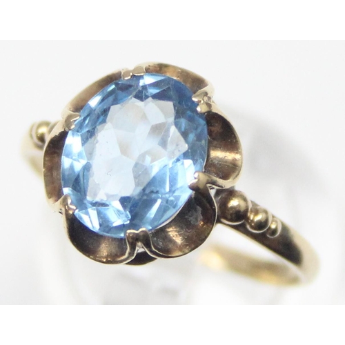 1114 - A vintage 9ct gold and blue stone cocktail ring, marks rubbed but XRF tested as 9ct gold, approx siz... 