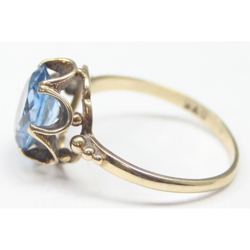 1114 - A vintage 9ct gold and blue stone cocktail ring, marks rubbed but XRF tested as 9ct gold, approx siz... 