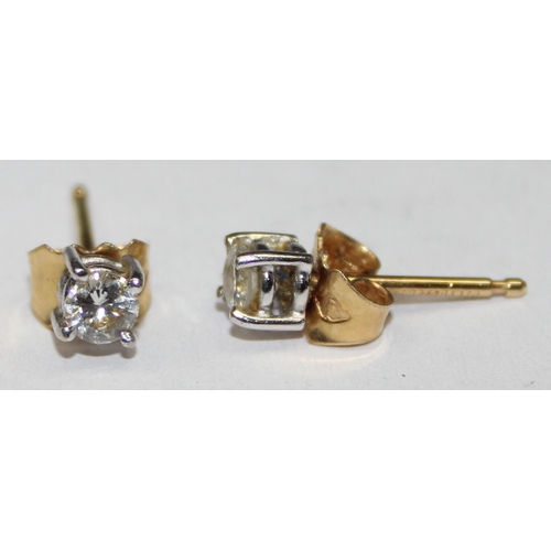 1115 - A pair of 18ct gold diamond stud earrings, indistinctly marked but XRF confirmed to be 18ct gold, ap... 