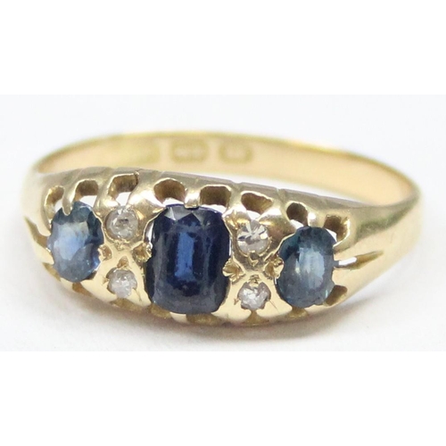 1128 - A Victorian 18ct gold diamond and sapphire ring with claw setting, marked for Birmingham 1886, appro... 