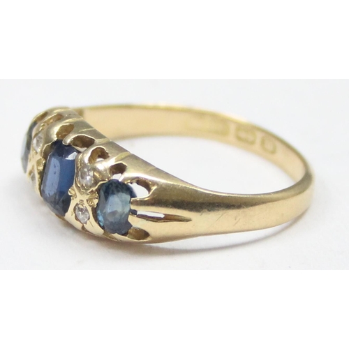 1128 - A Victorian 18ct gold diamond and sapphire ring with claw setting, marked for Birmingham 1886, appro... 