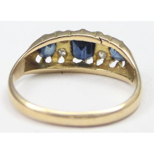 1128 - A Victorian 18ct gold diamond and sapphire ring with claw setting, marked for Birmingham 1886, appro... 