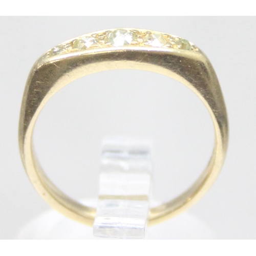 1129 - An 18ct gold and 5 stone diamond ring, 5 graduated stones, marked 18ct and XRF confirmed, total weig... 