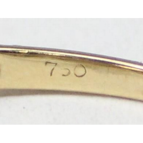 1130 - An 18ct gold and 3 stone diamond ring in angled setting, marked 750 and XRF confirmed, approx size N... 