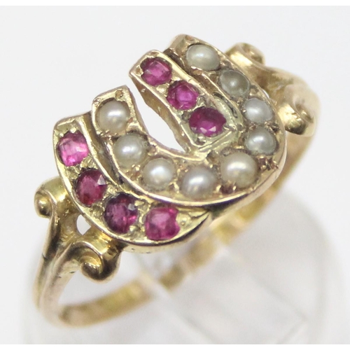 1131 - A Victorian 15ct gold double horseshoe ring, one set with seed pearls, the other with rubies, marked... 