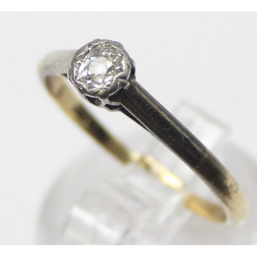 1105 - A vintage 18ct gold and solitaire diamond ring in platinum claw setting, marked and XRF confirmed, t... 