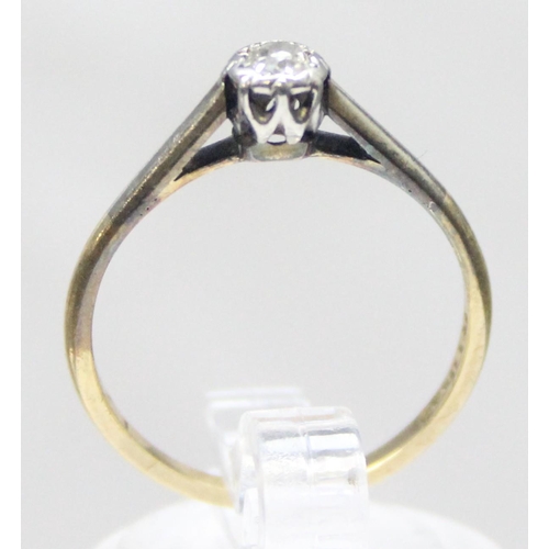 1105 - A vintage 18ct gold and solitaire diamond ring in platinum claw setting, marked and XRF confirmed, t... 