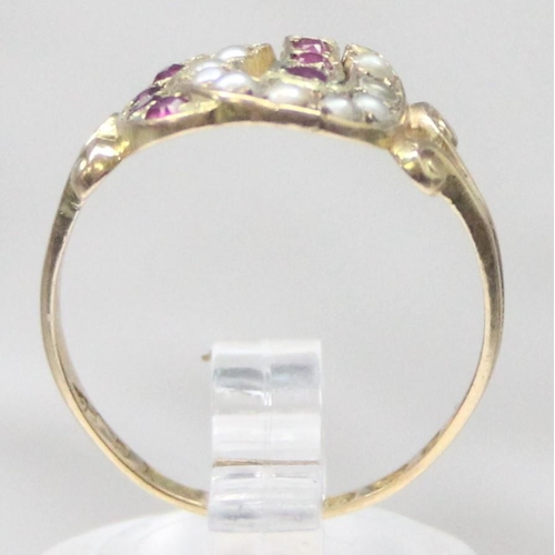 1131 - A Victorian 15ct gold double horseshoe ring, one set with seed pearls, the other with rubies, marked... 