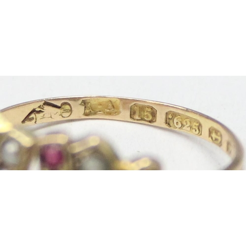 1131 - A Victorian 15ct gold double horseshoe ring, one set with seed pearls, the other with rubies, marked... 