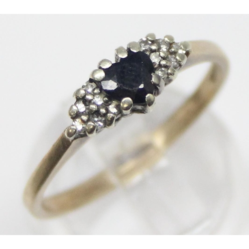 1132 - 9ct gold diamond and sapphire set ring, marked for London 1987, approx size R, approx 2.34g gross