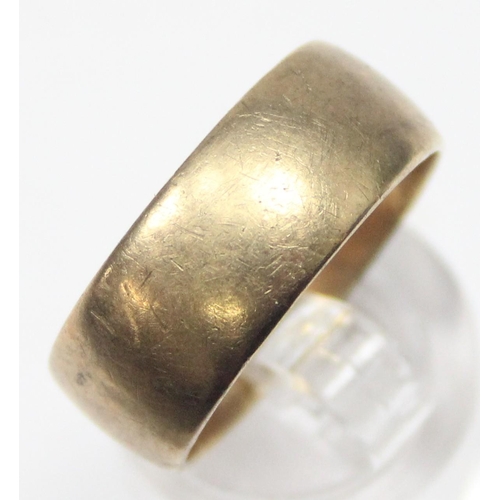 1141 - A heavy 9ct gold plain band ring, Sheffield 1978, approx size T, approx 7.01g gross