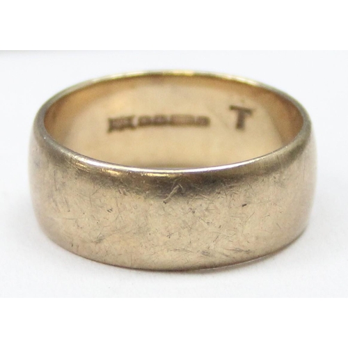 1141 - A heavy 9ct gold plain band ring, Sheffield 1978, approx size T, approx 7.01g gross