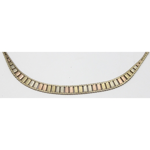 1146 - A retro 9ct gold necklace with herringbone links and 3 colour gold textured design, marked 375 and X... 