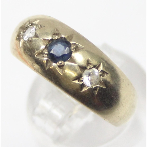 1149 - An antique style 9ct gold 3 stone gypsy set ring, a larger central sapphire flanked by 2 white stone... 