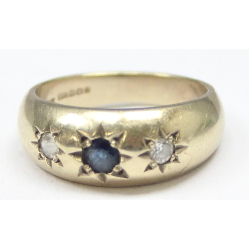 1149 - An antique style 9ct gold 3 stone gypsy set ring, a larger central sapphire flanked by 2 white stone... 