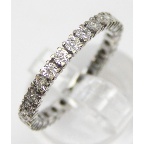 1154 - 18ct white gold and diamond eternity ring, marked 750 and XRF confirmed, approx size O, approx 2.56g... 